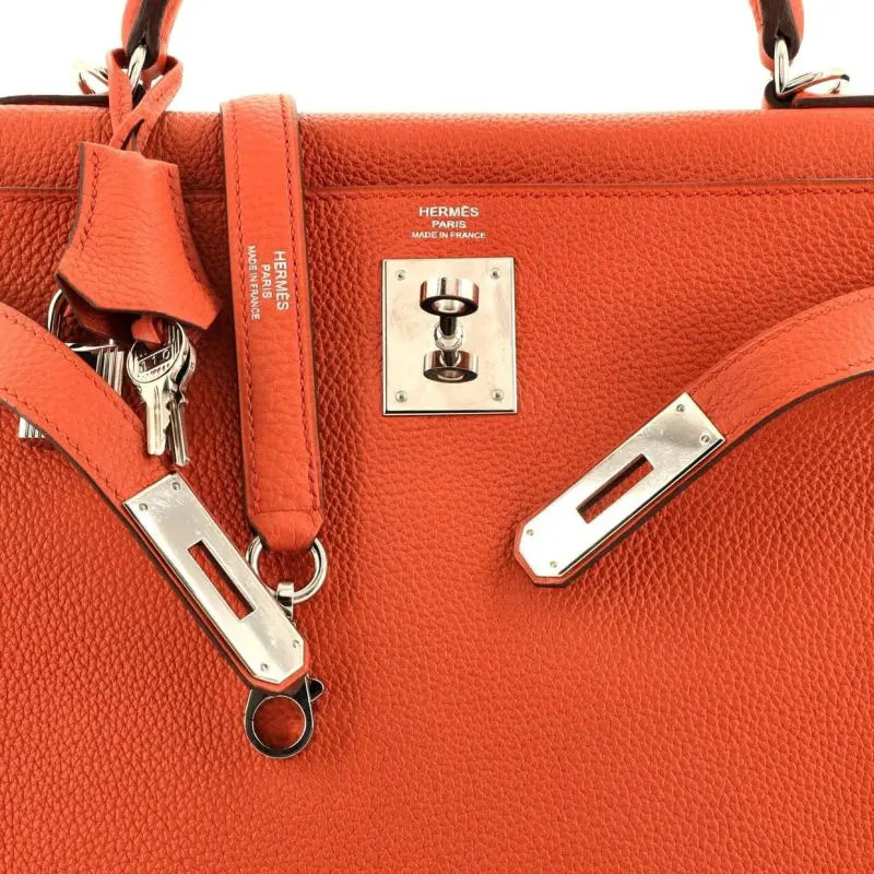 Pre-Owned Hermes Sac Kelly 28 Retourne Taurillon Clemence Leather Feu with Palladium Hardware
