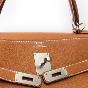 Pre-Owned Hermes Kelly Relax 50 Gold in Taurillon Novillo leather With Palladium Hardware