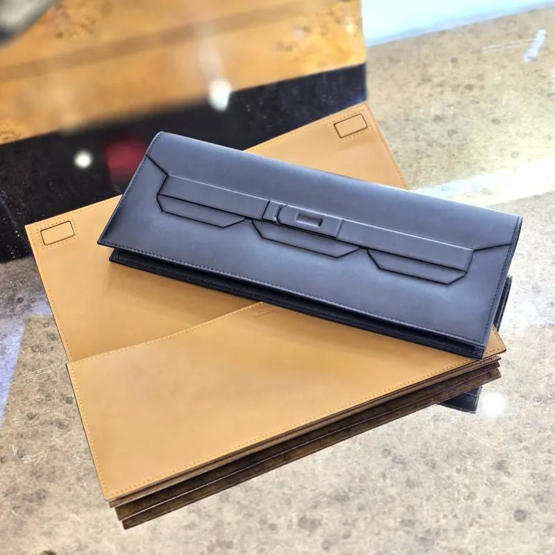 Pre-Owned Hermes Shadow Clutch Veau Swift Noir / Black